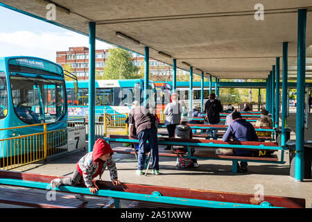 Passengers waiting at the bus station in Crewe Cheshire UK Stock Photo