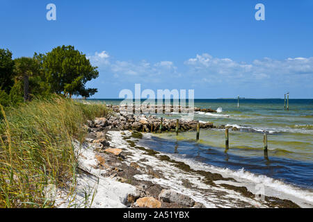 Stone Jetties on Anna Maria Island to minimize beach erosion from rising tides in Tampa Bay Stock Photo
