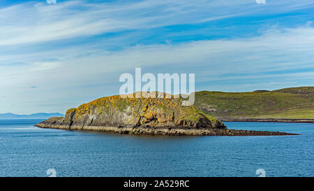 Island off Duntulm coast - Isle of Skye Stock Photo