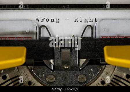 old typewriter with text wrong - right Stock Photo
