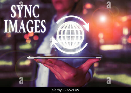 Handwriting text writing Sync Images. Conceptual photo Making photos identical in all devices Accessible anywhere Stock Photo