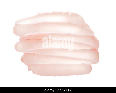 Delicate pink texture and strokes of a cosmetic face mask or cream on a white background Stock Photo