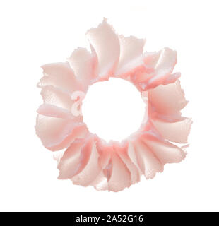 Delicate pink texture and strokes of a cosmetic face mask or cream on a white background Stock Photo
