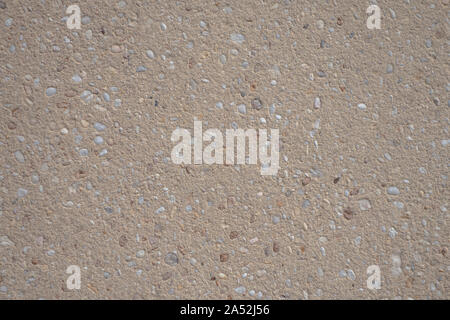 cemented small pebble round stone rock wall or floor Stock Photo