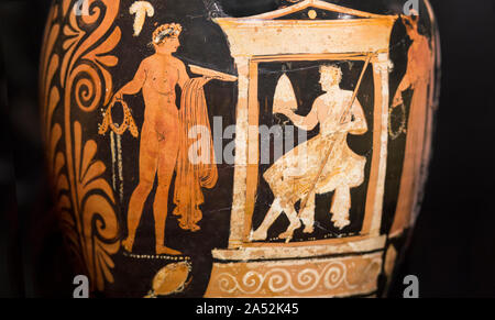 Malaga, Spain - March 2nd, 2019: Amphora from Apulia with warrior in temple, 350 BCE. Ifergan Collection Stock Photo
