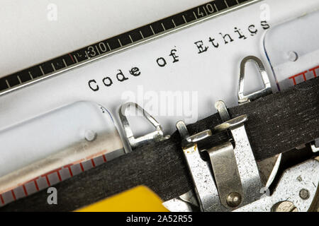 old typewriter with text code of ethics Stock Photo