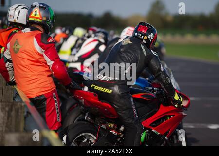 Dalton on Tees, England, 12 October 2019. Riders ready for the warm up lap for their three hour endurance race during the No Limits meeting at Croft Circuit. Stock Photo