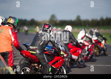 Dalton on Tees, England, 12 October 2019. Riders set off on the warm up lap for their three hour endurance race during the No Limits meeting at Croft Circuit. Stock Photo