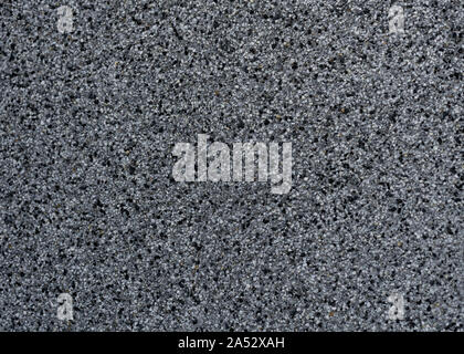 Grey and black fragments of pavement, texture. Background with copy space Stock Photo