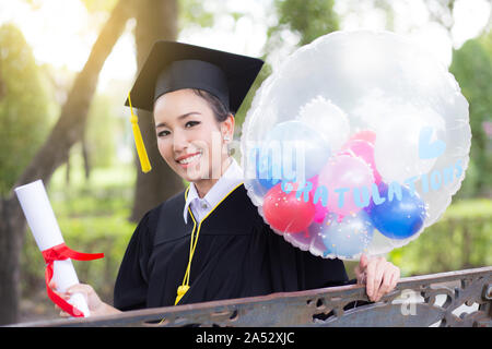 Graduation gown asian hi-res stock photography and images - Alamy