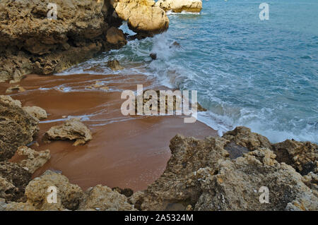 Aveiros beach scene during afternoon. Unique rocks and cliffs formations. Albufeira, Algarve, Portugal Stock Photo