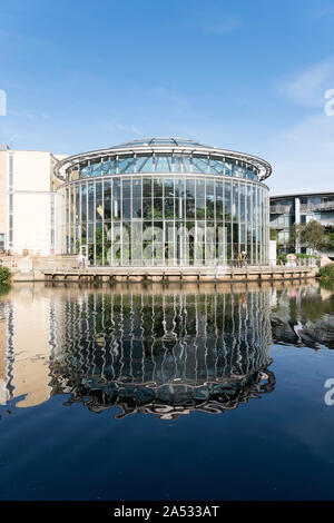 City of Sunderland Winter Gardens reflected in the lake within Mowbray Park, Sunderland, north east England, UK Stock Photo