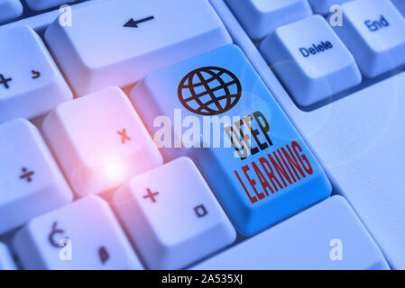 Word writing text Deep Learning. Business photo showcasing Hierarchical Abstractions Artificial Intelligence Algorithm White pc keyboard with empty no Stock Photo