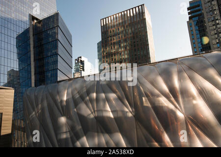 The Vessel structure and The Shed, a cultural venue, are in  the Hudson Yards Complex, New York City, USA Stock Photo