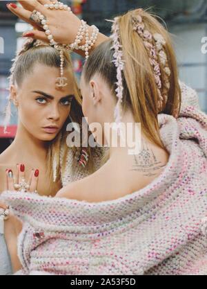 poster advertising CHANEL with Cara Delevingne in paper magazine from 2014, advertisement, creative CHANEL advert from 2010s Stock Photo