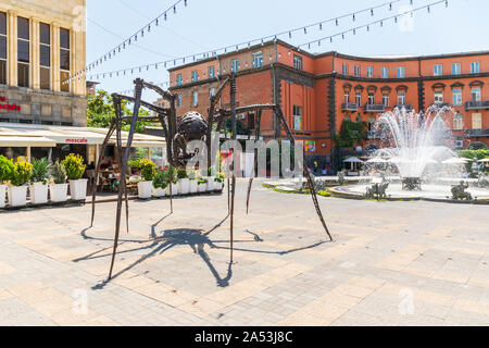 Armenia. Yerevan. August 16, 2018. Spider sculpture at Charles Aznavour Square. Sculpture by Ara Alekyan. Stock Photo