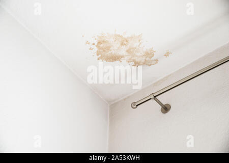 Ceiling Damaged By Water Leak At Home Stock Photo