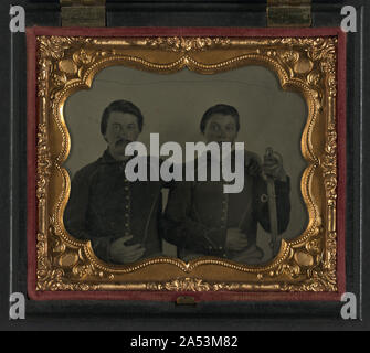 Two unidentified young soldiers in Union uniforms in front of painted ...