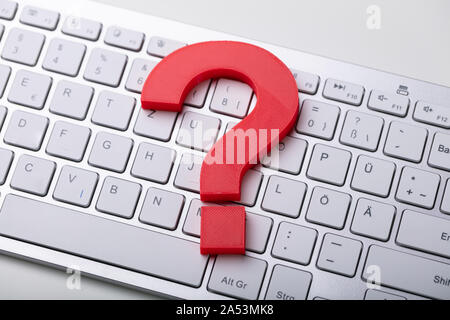Photo Of Red Question Mark On Computer Keyboard Stock Photo