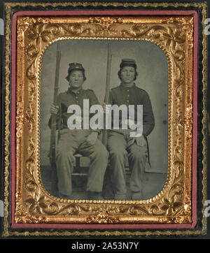 A historical photograph of two unidentified soldiers wearing Union ...