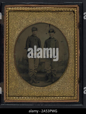 Two unidentified young soldiers in Union uniforms in front of painted ...