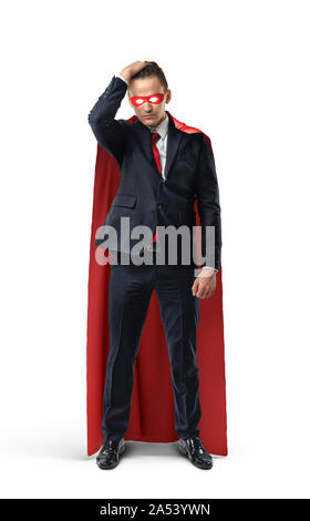 A sad businessman in a superhero red cape standing with his shoulders slumped and looking down Stock Photo - Alamy A sad businessman in a superhero red cape standing with his shoulders slumped and looking down Stock Photo - Alamy