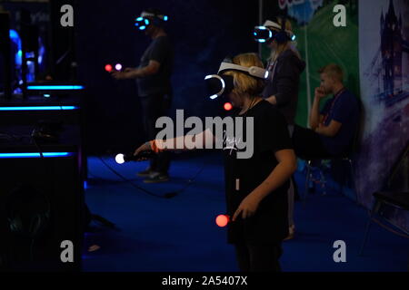 Prague, Czech Republic. 17th Oct, 2019. Visitors try new video games during the For Games fair in Prague, the Czech Republic, on Oct. 17, 2019. The For Games, Trade Fair for Video Games and Interactive Entertainment, opened on Thursday in Prague. Some 200 exhibitors from domestic and abroad brought their latest video games to attract game lovers. Credit: Dana Kesnerova/Xinhua/Alamy Live News Stock Photo