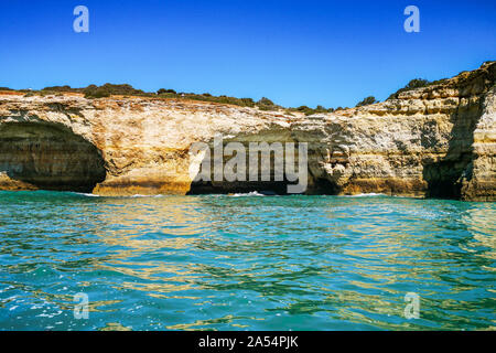 Landscape of Algarve coastline has many sea caves inside the cliffs overlooking the Atlantic Ocean, Portugal Stock Photo