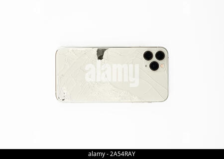 Broken back cover of Phone, isolated on white background Stock Photo