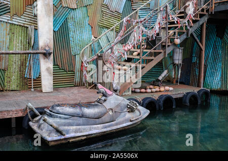abandoned water motorbike on a abandon pier Stock Photo