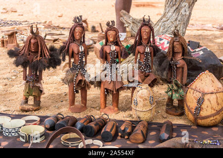Traditional jewelry, wooden puppets, handcraft made by Himba people, Kaokoland, Namibia, Africa Stock Photo