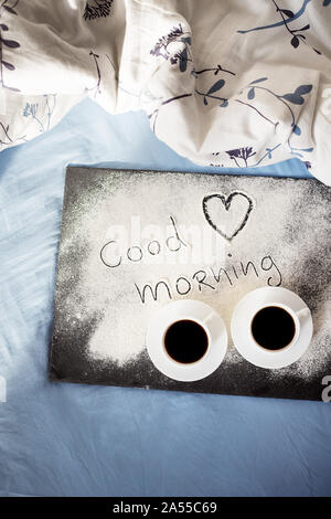 good morning inscription flour on a board-Valentine's day, sunny morning. Stock Photo