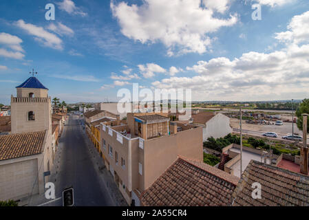 Church of Our Lady of Monserrate in Plaza del Leon, Daya Vieja, Alicante, Spain, Europe. View from viewing structure over homes, roofs and countryside Stock Photo