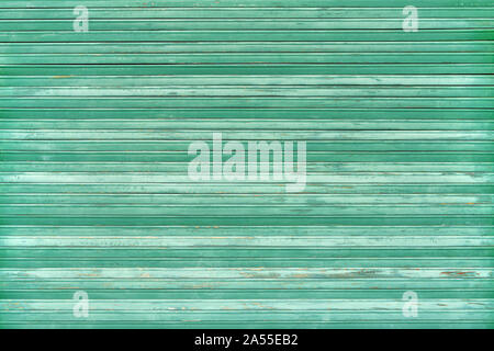 Green old weathered blind made of wood Stock Photo