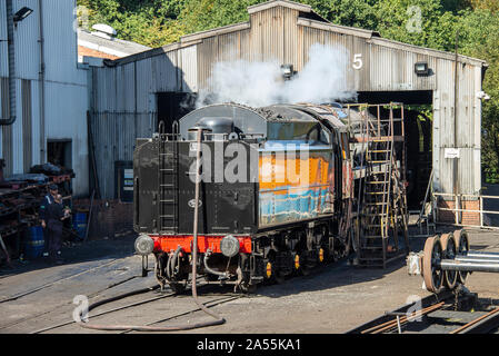 Maintenance Work Being Carried Out on Steam Engine 92134 Former British Railways 9F at Grosmont North Yorkshire England United Kingdom UK Stock Photo