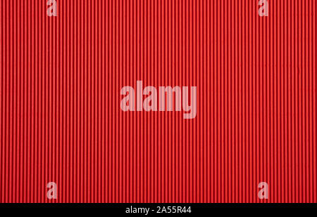Corrugated cardboard paper red color background and texture, copy space. Stock Photo