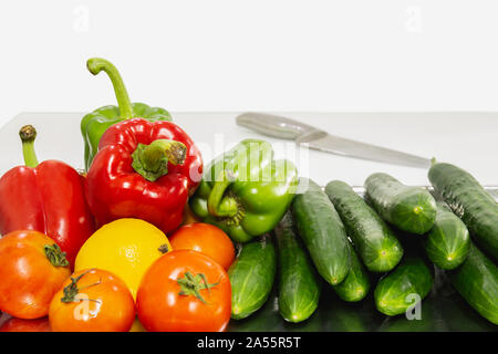 Vegetable group composition made from sweet pepper cucumber tomato on white background Stock Photo