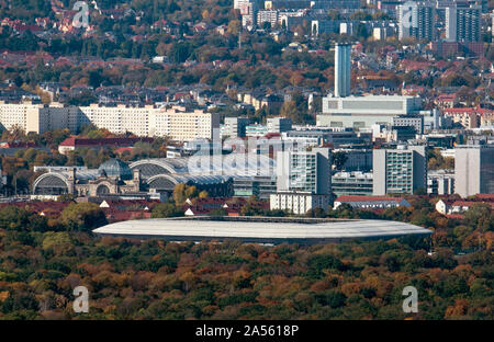12 October 2019, Saxony, Dresden: View from the viewing platform on the Dresden television tower during an open day for selected persons on the occasion of the 50th anniversary of the official inauguration of the tower onto the Rudolf Harbig Stadium and the main railway station (l). The 252 metre high television tower was opened on 7 October 1969. The tower was closed to the public in the middle of 1991. Since then it has been regarded as an important building of Eastern Modernism. At a height of 145 metres there was a restaurant on two floors, above it a viewing platform. Before the closure, Stock Photo
