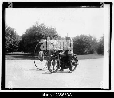 Velocipede and motorcycle Stock Photo