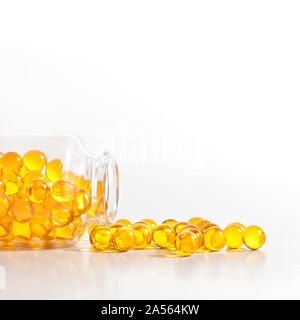 Download Yellow Capsules From Glass Bottle On Blue Background Copyspace For Text Epidemic Painkillers Healthcare Treatment Pills And Drug Abuse Concept Stock Photo Alamy Yellowimages Mockups