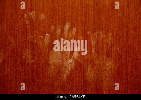 Hand marks on wooden wall / hand prints Horror scary dirty fingerprint The concept of loneliness and abandonment and Horror scary Ghost in home door o Stock Photo