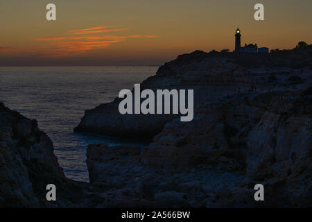 Alfanzina lighthouse during sunset in Portugal Stock Photo