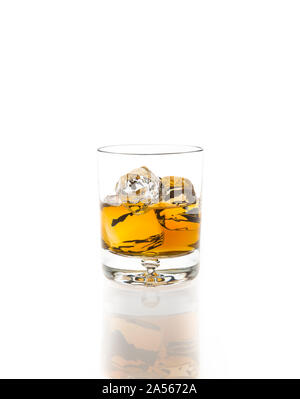 Bourbon on ice against white background. Stock Photo