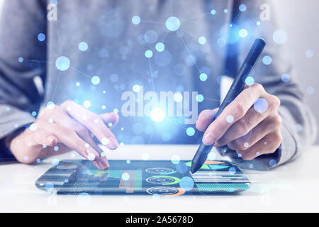 Project management and internet researching process. Man in business suit typing on laptop keyboard. Virtual geometric graphics with circle elements. Stock Photo