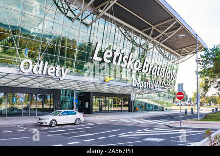 BRATISLAVA, SLOVAKIA – OCTOBER 6 2019: entrance into Departure hall of Bratislava airport terminal with big letter sign “M. R. Stefanik Airport Bratis Stock Photo