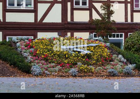 Wernigerode, Germany 14. / 15. October 2019: Wernigerode Impressions - October 2019 Flower Clock at the Marktstrasse in Wernigerode, half timbered, flowers, clock, Feature / Symbol / Symbolfoto / charakteristisch / Detail / | usage worldwide Stock Photo