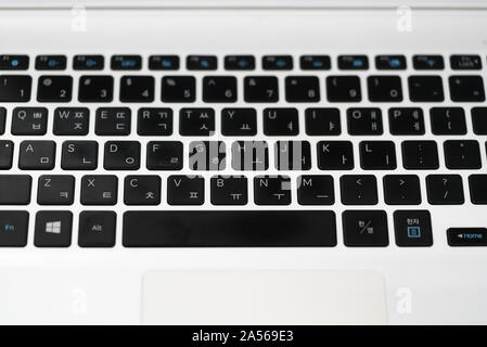 Close-up view of Korean and English keyboard Windows laptop keyboard black color alphabet button, by Samsung Electronics Co., Ltd. is South Korean ele Stock Photo