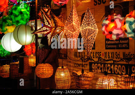 Colourful Modern Lanterns in Various Size & Shapes Akash kandil or Diwali decorative lamps Hang out side shop for sale; celebrating diwali Festival. Stock Photo