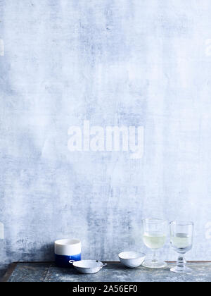 Still life arrangement of wine glasses and small bowls Stock Photo