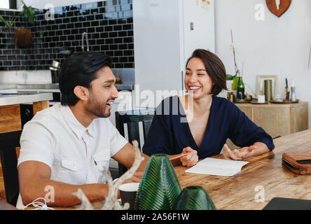Colleagues having discussion in office Stock Photo